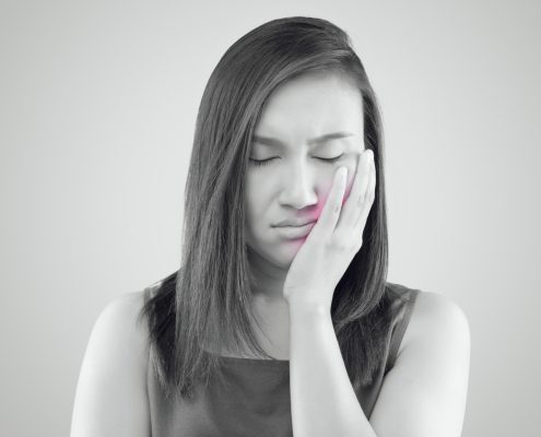 suffering-from-toothache-asian-woman-wearing-red-shirt-suffering